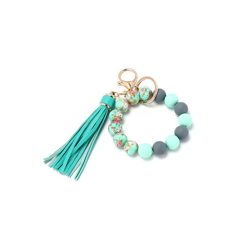 Wholesale Silicone Food Grade Cartoon Tassel Printed Silicone Wrist Keychain